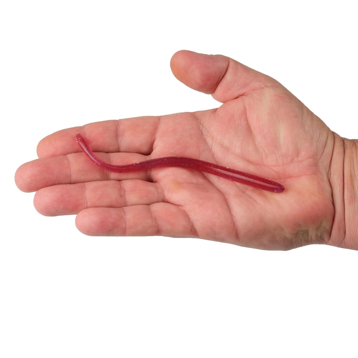 A 6 inch Berkley Lab Series Finesse Worm that is a pink in a hand.