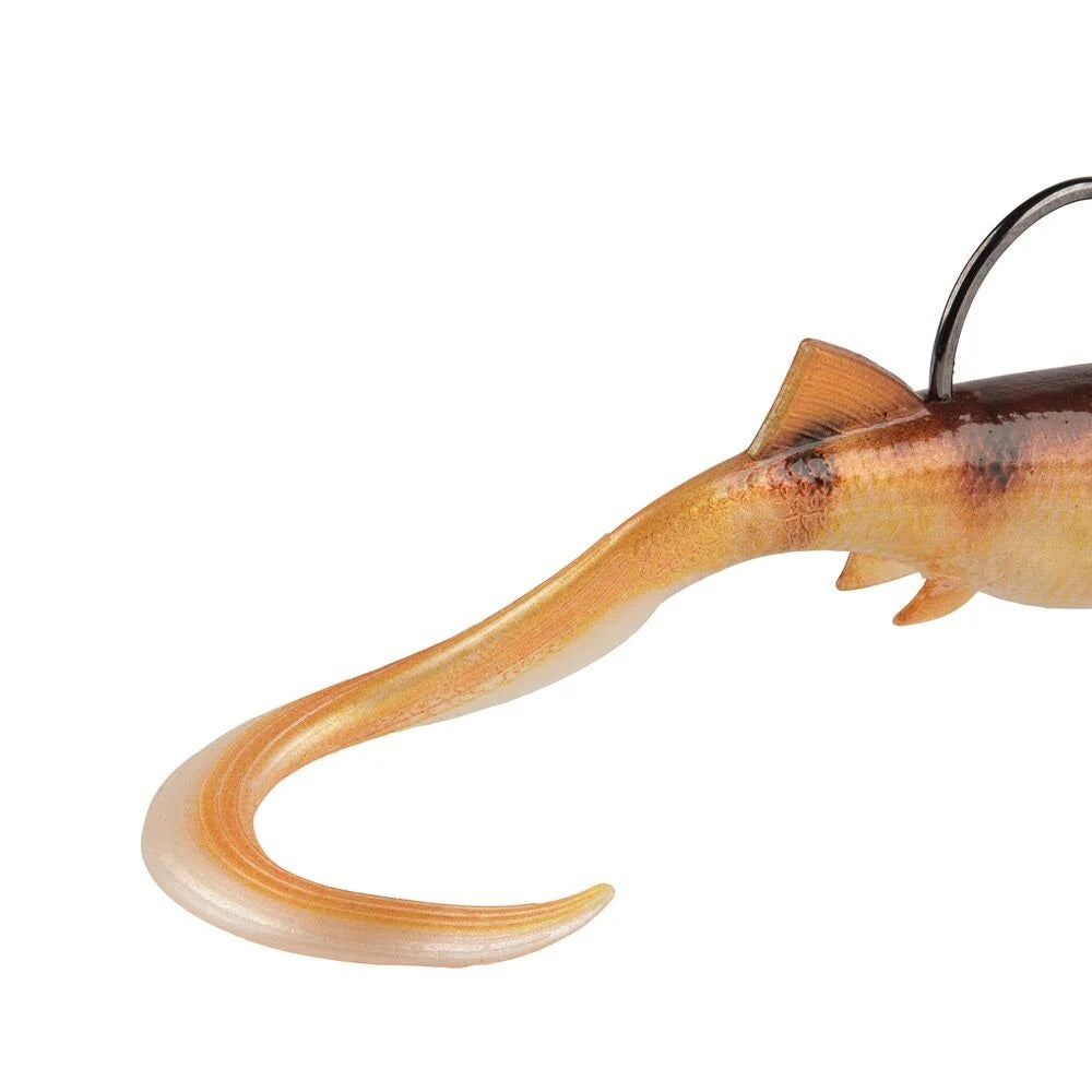 The tail of a 2.5 inch Berkley PowerBait Minnotator Grub that is orange.