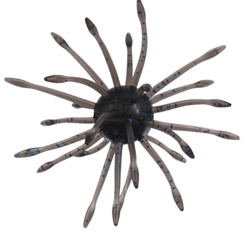 A 16 millimeter Gary Yamamoto Uni HD Urchin Bait that is black with blue flakes.