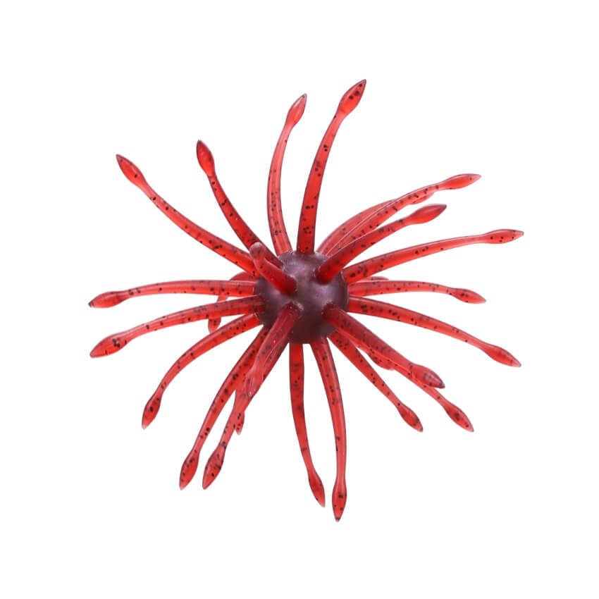 A 20 millimeter Gary Yamamoto Uni Mas Urchin Bait that is red with small blue flakes.